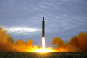 A missile is launched during a long and medium-range ballistic rocket launch drill